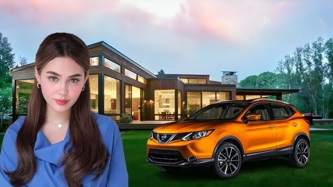 Woman standing beside modern luxury house and orange SUV car