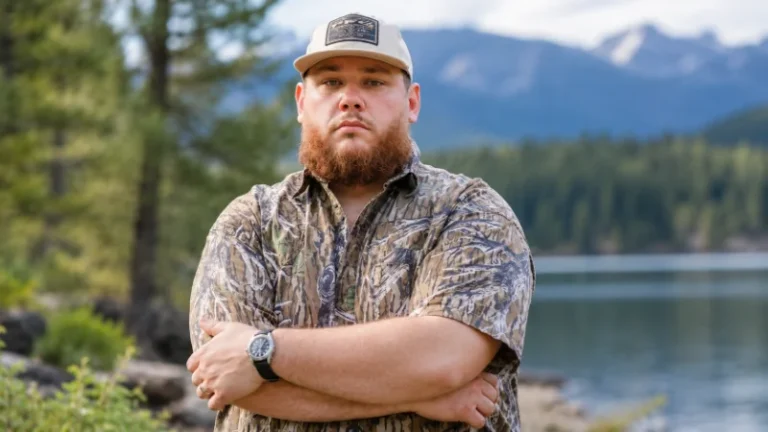 Luke Combs performing live on stage during an arena tour