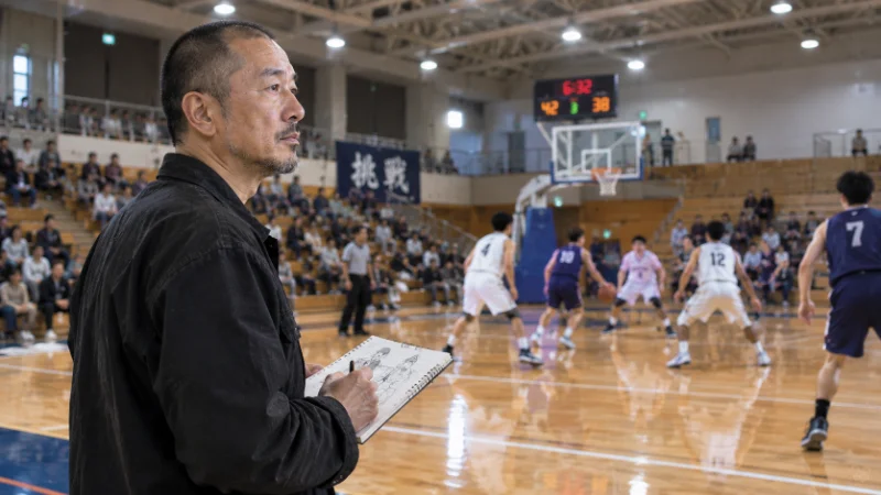 Takehiko Inoue observing basketball players for manga research